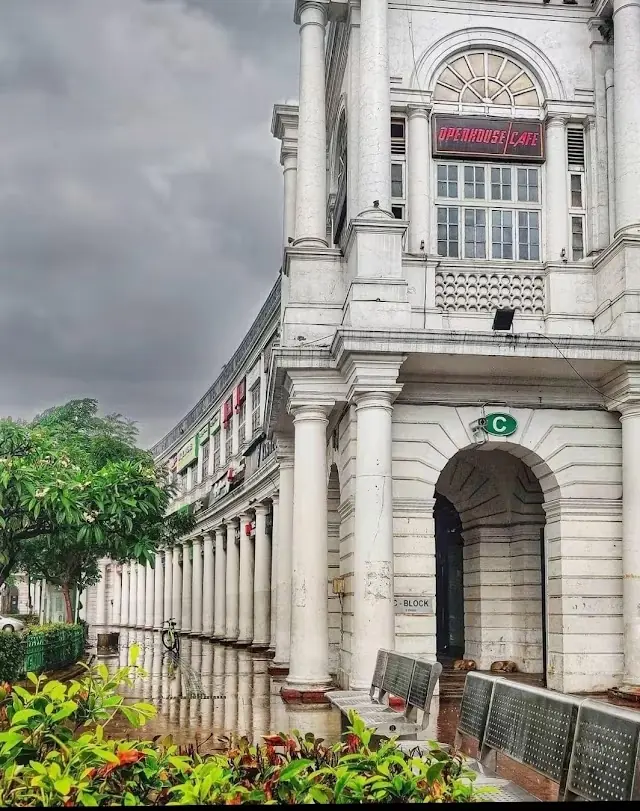 The building at Connaught Place, New Delhi, seen from the pavement below.