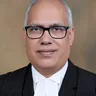 Adv. Dr. Vijay Mishra, Counsel